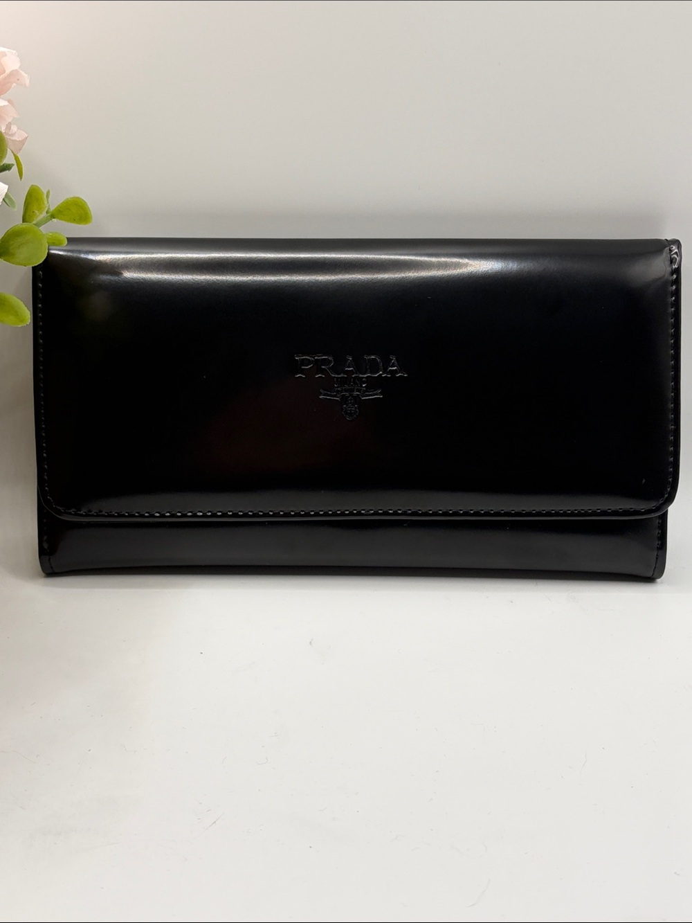 Sleek Black Faux Leather Replica Spazzolato Tri-Fold Wallet